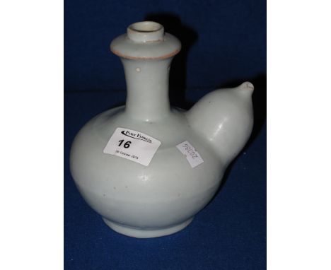 South east Asian style Kendi type baluster ewer with mammiform spout and overall light bluish glaze.  Underglaze blue square 
