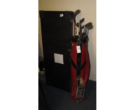 Bag of assorted golf clubs to include Dunlop Maxfli, Buildmore, a hicory handled driver, and similar vintage putter. 