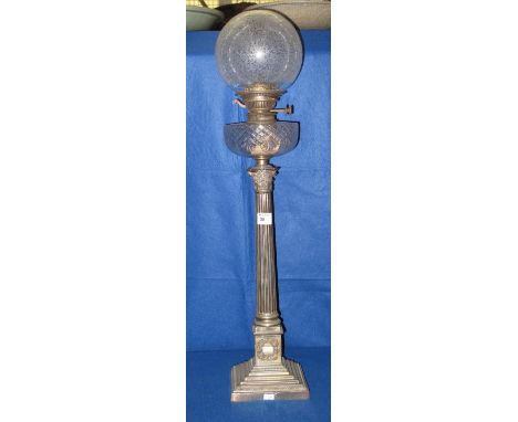 One silver plated Corinthian column double burner brass oil lamp with clear cut glass reservoir, etched glass globular shade 