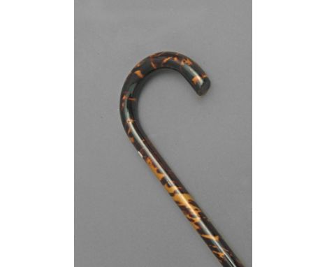 A first third of 20th century walking stick. Carved wood and tortoiseshell shaft and handle, 93 cm. long. Tortoiseshell speci