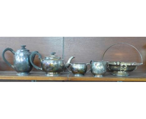 A four piece plated tea service and a plated basket, both by Walker &amp; Hall 