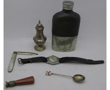 A silver pepper, a silver spoon, a silver and mother of pearl knife a hip flask, a goldstone seal and a Services wristwatch 