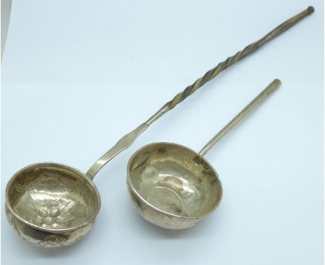 A toddy ladle with baleen handle and a part ladle inset with a George II coin 