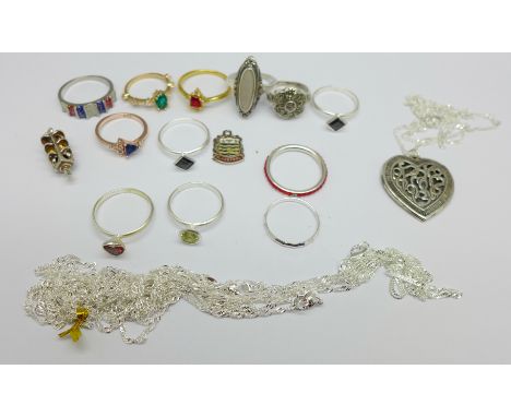 Jewellery; twelve ring, chains marked 925 and two charms 