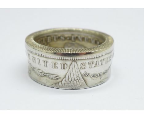 A large ring made from an American 1883 silver one dollar coin, 22.4g 