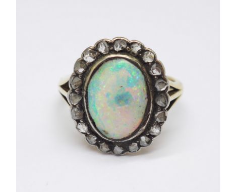 An 18ct gold, opal and old cut diamond ring, opal a/f, 6.7g, R 