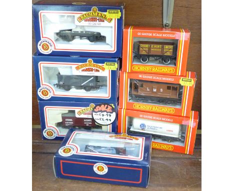 Four Bachmann Branch-Line OO gauge model railway wagons and three Hornby Railways OO gauge model railway wagons including ICI