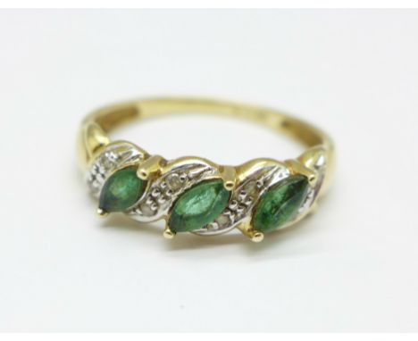 A 9ct gold, diamond and emerald ring, 1.9g, O 