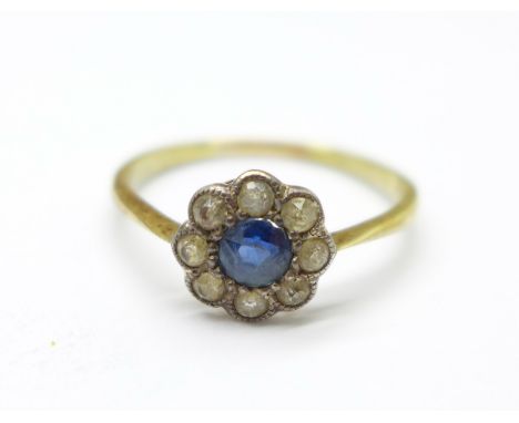 A 15ct gold, blue and white stone cluster ring, 1.4g, M, in a vintage green Bakelite box 