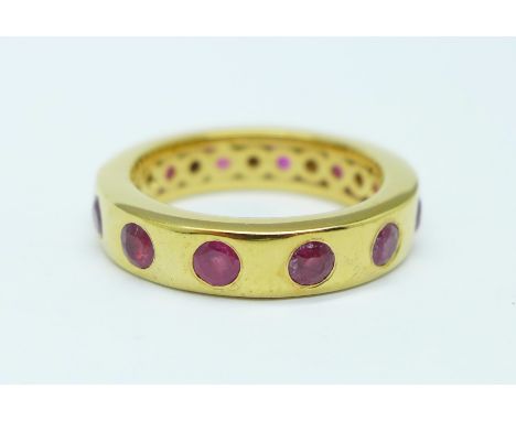 A silver gilt and ruby eternity ring, M 