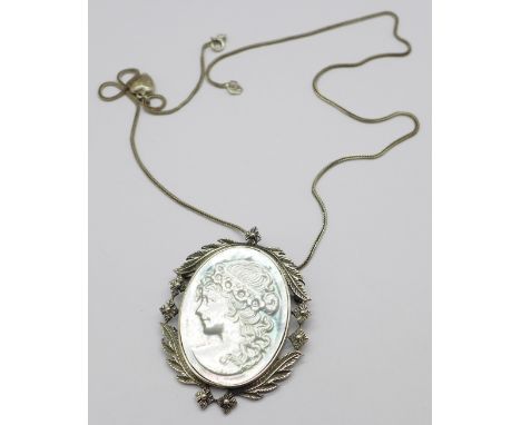 A silver and mother of pearl cameo brooch/pendant on chain 