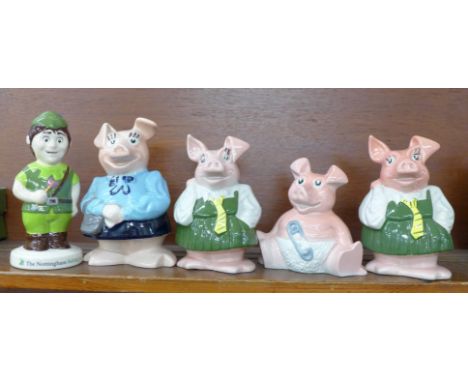 Four Wade Nat West pig money banks and a Nottingham Building Society Robin Hood money box, boxed 