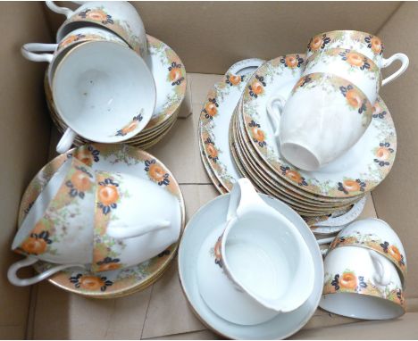 A floral decorated china tea service, some pieces a/f **PLEASE NOTE THIS LOT IS NOT ELIGIBLE FOR POSTING AND PACKING** 