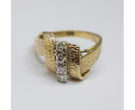A 1970's style, yellow metal and diamond ring, marked 14K, 4.6g, R 