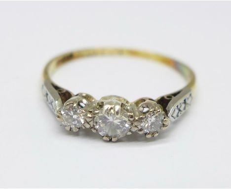 An 18ct gold, platinum set three stone diamond ring, 2.3g, Q 