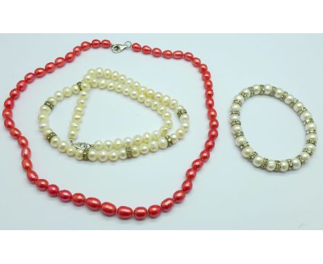 Two pearl necklaces and a bracelet 
