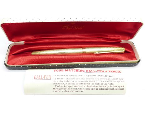 A 9ct gold cased Parker 61 pen, with case and leaflet 