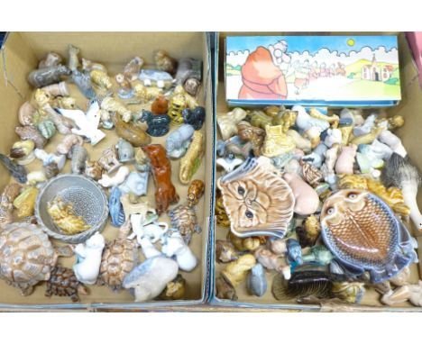 A large collection of mainly Wade Whimsies including Disney Hat Box characters and a boxed set of Friars 