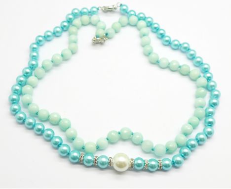 An 'aquamarine' faceted bead necklace and a pearl and turquoise coloured bead necklace 