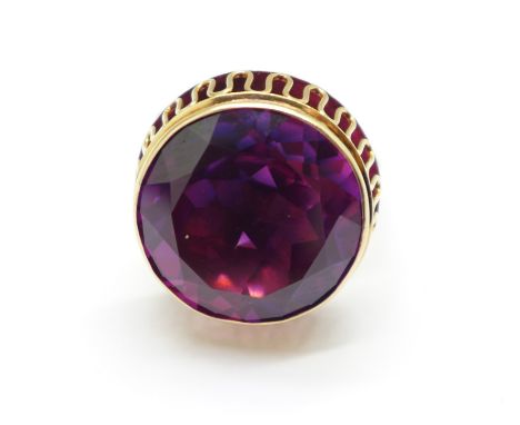 A 14ct gold and amethyst ring, with Swedish hallmark and inscription dated 1969, 20.5 carat weight stone, 18mm diameter, 8.9g