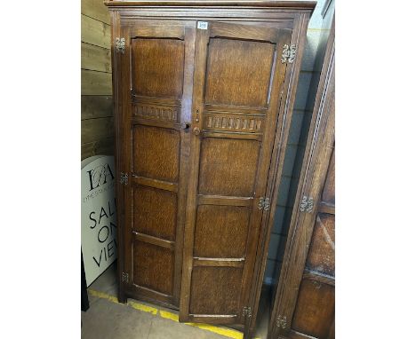 20th century furniture, Waring and Gillow, Gentleman's wardrobe, twin doors, single hanging space shelves for shirts etc, tie