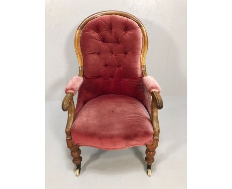 Antique Furniture, 19th century balloon back arm chair, upholstered button back, padded seat and arms, ceramic castors 