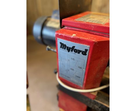 Woodworking/ Woodturning Lathe: A Myford woodturning lathe model MYSTRO comes attached to woodworking bench with all the atta