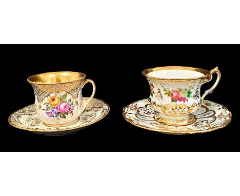 Set of two Bohemian handpainted cups & saucers, late 19th century.Thick exterior bowl walls decorated with circular gilt deco
