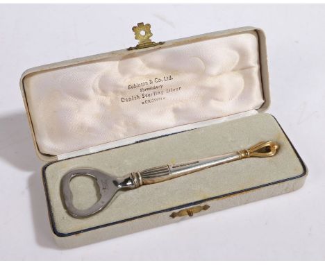 W &amp; S Sorensen Danish silver bottle opener, the gadrooned tapering handle with gilt pierced crown form terminal, 14cm lon