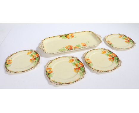 Clarice Cliff A.J.Wilkinson Ltd. Honeyglaze Bizarre sandwich set, consisting of tray and four side plates, with orange foliat