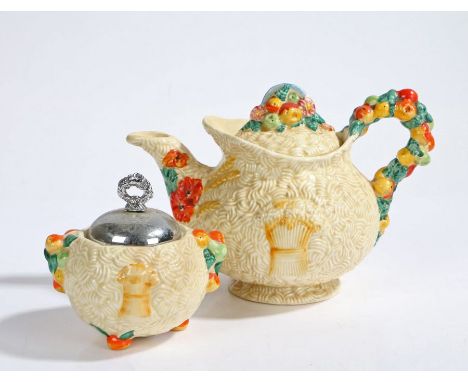 Clarice Cliff Newport Pottery "Celtic Harvest" pattern teapot and preserve pot, with moulded leaf and fruit decorated handles