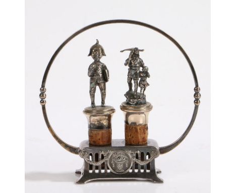 WMF bottle stopper stand, with circular beaded loop handle above a pierced swag decorated base with central depiction of&nbsp