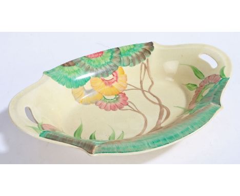 Clarice Cliff A.J. Wilkinson Ltd. Honeyglaze Bizarre "Rhodanthe" pattern dish, the oval body with pierced handles and polychr