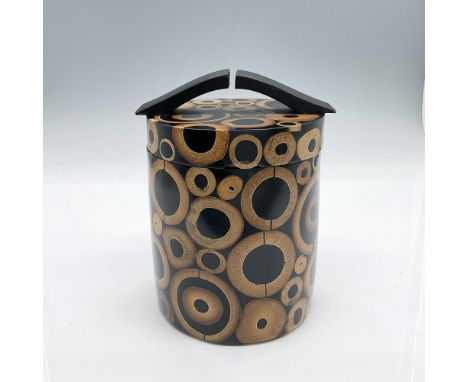 Bamboo Inlay and ebonized wood create a unique pattern on this cylindrical box. The lid has a modern design handle. R &amp; Y