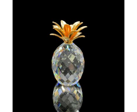 This retired figurine is made from clear faceted crystal with smooth gold leaves. Swarovski acid mark on the bottom. The item