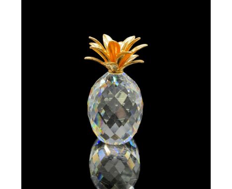 This retired figurine is made from clear faceted crystal with smooth gold leaves. Swarovski acid mark on the bottom. The item