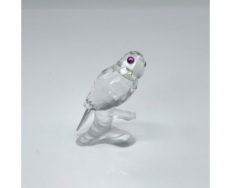 Crafted from clear crystal, this parrot features a frosted beak and sits elegantly on a frosted base, part of the Up in the T