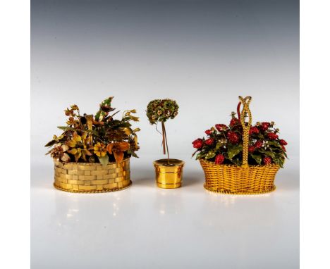 Elegant metal decorative pieces resembling overflowing baskets and a charming topiary tree. The colored accents are crafted f