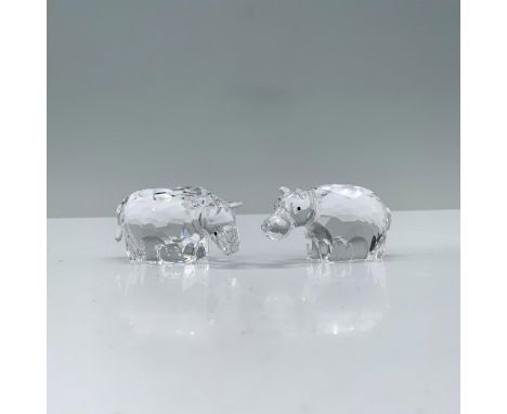 Meticulously crafted with precise facial features, subtly turned heads, and striking black crystal eyes, the essence of these
