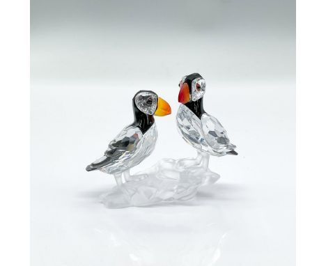 Dazzling figure in clear and black cut crystal of two puffins on a frosted base. Swarovski mark.ï¿½This item has its original