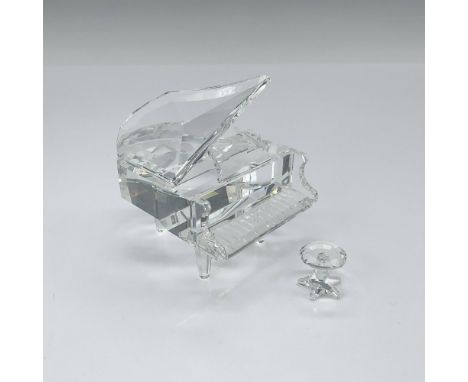 The clear crystal grand piano and stool, both part of the Cheerful Times group, are crafted from brilliant clear crystal. Swa