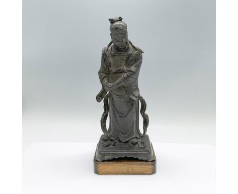 A heavy figure of a nobleman, or possible a scholar, in a long robe. This item has a base included: 4.75"L x 3.75"W x 1"H. Fi