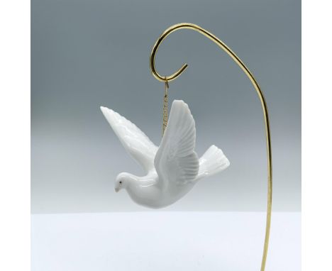 Glossy finish; Lladro backstamp. This item has its original box which measures 4.75"L x 4.25"W x 3.75"H. Artist: Jose PucheIs