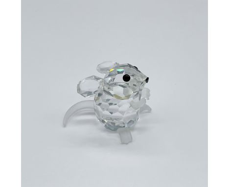This mouse figure, crafted from clear faceted crystal, features charming black eyes and nose, complemented by frosted hands a