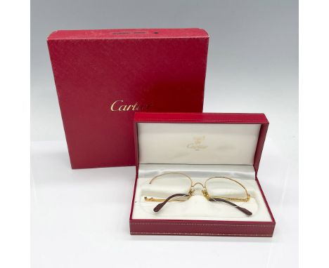 Cartier optical glasses featuring a rimless design with gold-colored metal nose bridge and arms. Nose bridge marked 55 and 18