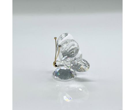Sparkling clear faceted figure of a crystal butterfly with crystal tipped gold antennae. Part of the In A Summer Meadow colle