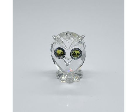 This mini owl, part of the Feathered Beauties theme group, is crafted from faceted clear crystal, featuring Citron crystal ey