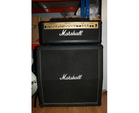 Marshall guitar speaker cabinet and a Marshall amplifier head G100R model. 