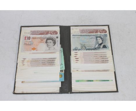 Folder of English banknotes to include BANK OF ENGLAND £10, £5, multiple ten shillings notes, USA twenty dollars 2009, South 