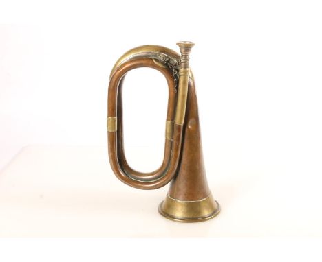 Pre-WWI copper and brass bugle inscribed 'Henry Potter &amp; Co 36 West St Charing (images of a cross) Road London 1906', 27c